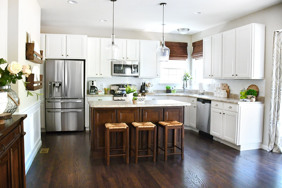 White Kitchen With Dark Island
 White Cabinets Dark Kitchen Island for Your Home