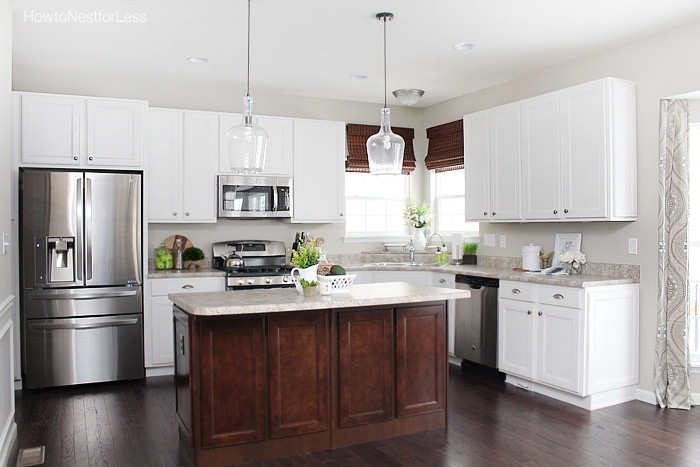 White Kitchen With Dark Island
 Kitchen Updates and Bar Stool Ideas How to Nest for Less™