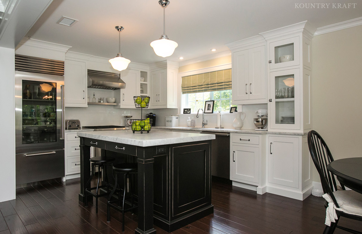 White Kitchen With Dark Island
 Black Kitchen Island and White Cabinets in Chatham NJ