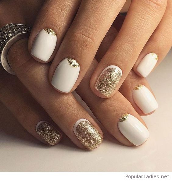 White Nails With Gold Glitter
 White nails with some gold glitter